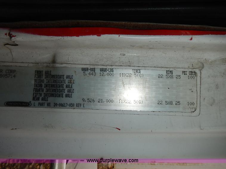 image for item J6341 1997 Freightliner FL70 rollback truck