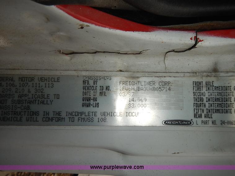 image for item J6341 1997 Freightliner FL70 rollback truck