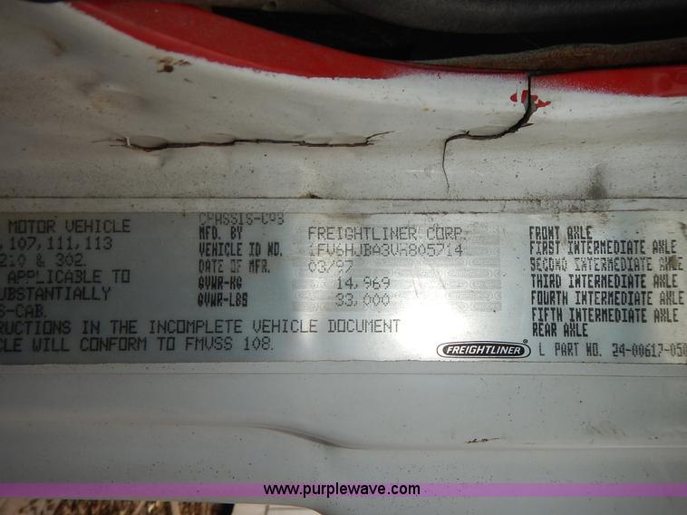 image for item J6341 1997 Freightliner FL70 rollback truck