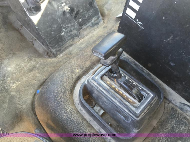 image for item J8415 1989 Ford Elgin Crosseind Series G street sweeper