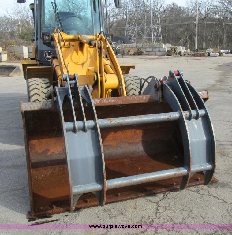 image for item K5211 2004 John Deere 304H wheel loader