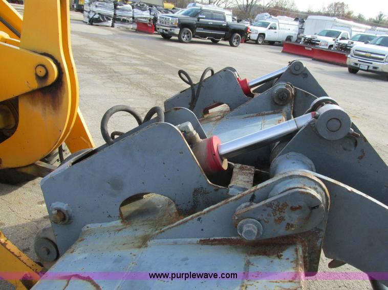 image for item K5211 2004 John Deere 304H wheel loader