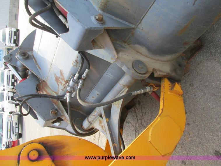 image for item K5211 2004 John Deere 304H wheel loader