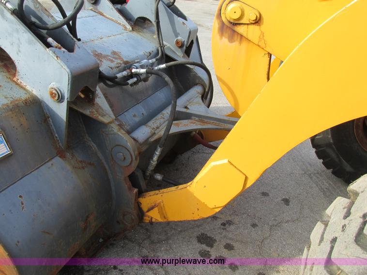 image for item K5211 2004 John Deere 304H wheel loader