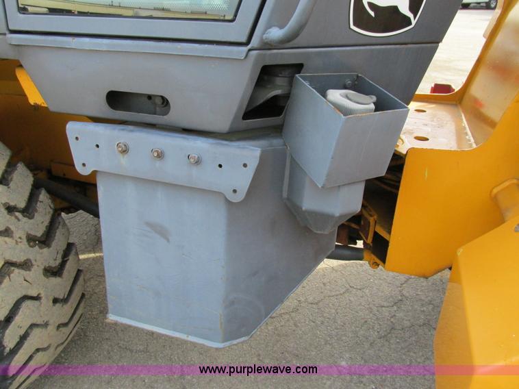 image for item K5211 2004 John Deere 304H wheel loader