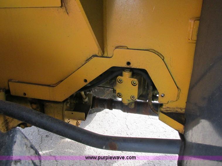image for item K5211 2004 John Deere 304H wheel loader