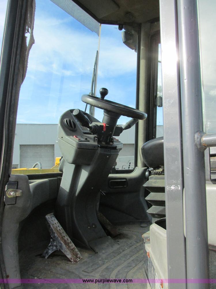 image for item K5211 2004 John Deere 304H wheel loader