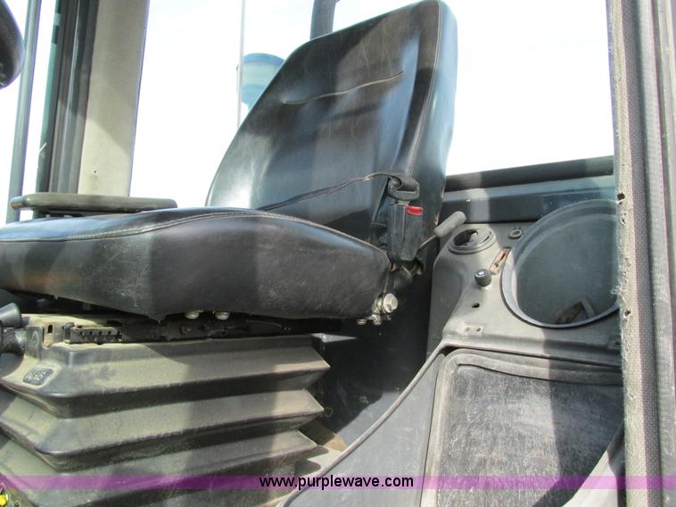 image for item K5211 2004 John Deere 304H wheel loader