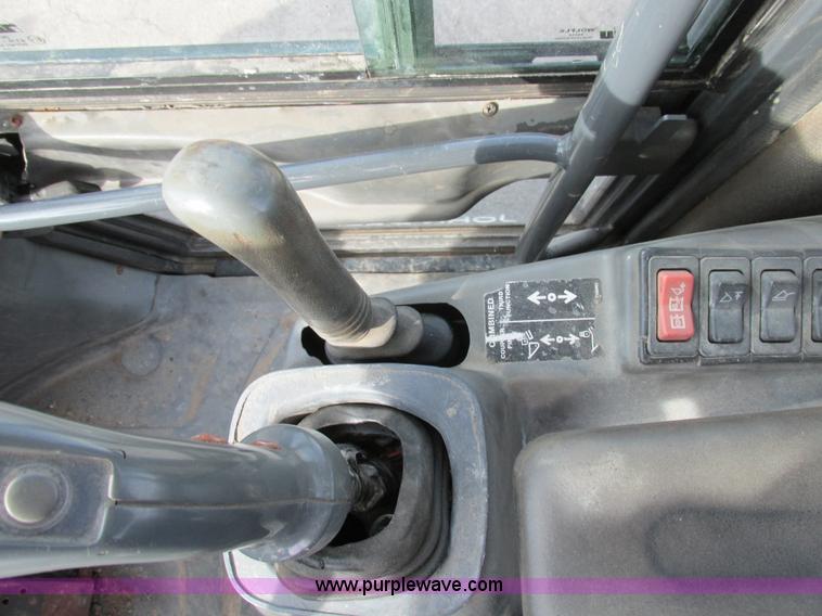 image for item K5211 2004 John Deere 304H wheel loader