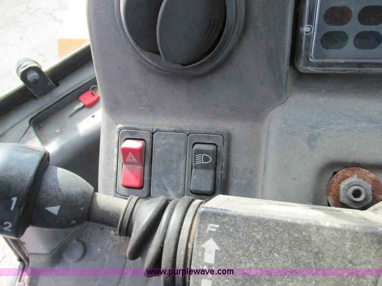 image for item K5211 2004 John Deere 304H wheel loader