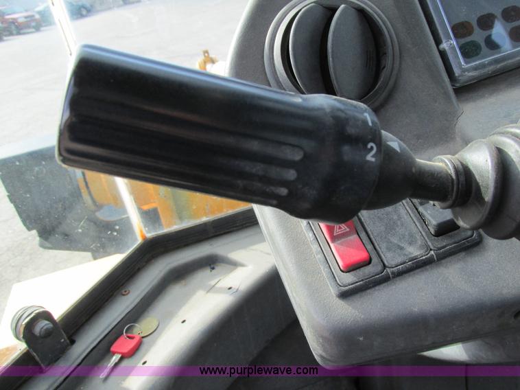 image for item K5211 2004 John Deere 304H wheel loader