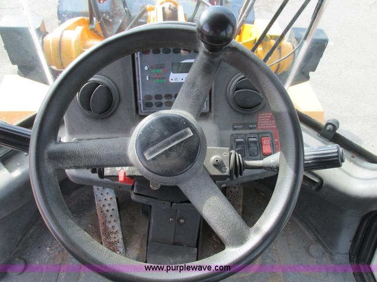 image for item K5211 2004 John Deere 304H wheel loader