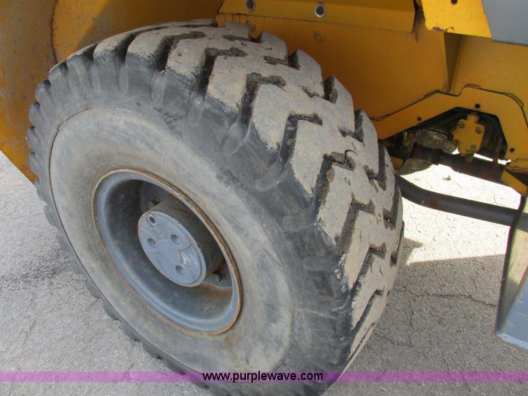 image for item K5211 2004 John Deere 304H wheel loader