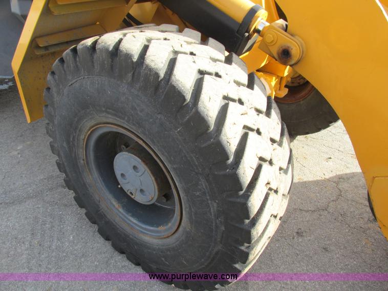 image for item K5211 2004 John Deere 304H wheel loader