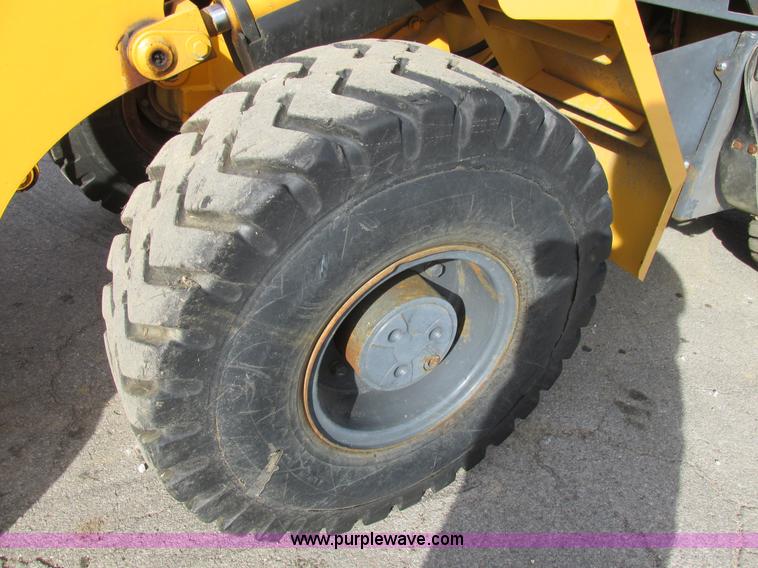 image for item K5211 2004 John Deere 304H wheel loader