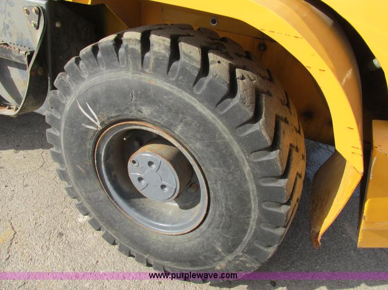 image for item K5211 2004 John Deere 304H wheel loader