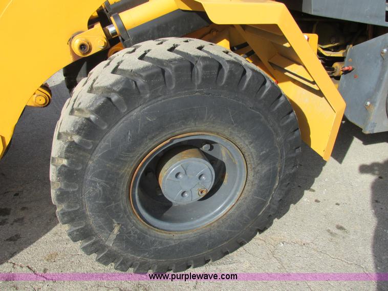 image for item K5211 2004 John Deere 304H wheel loader