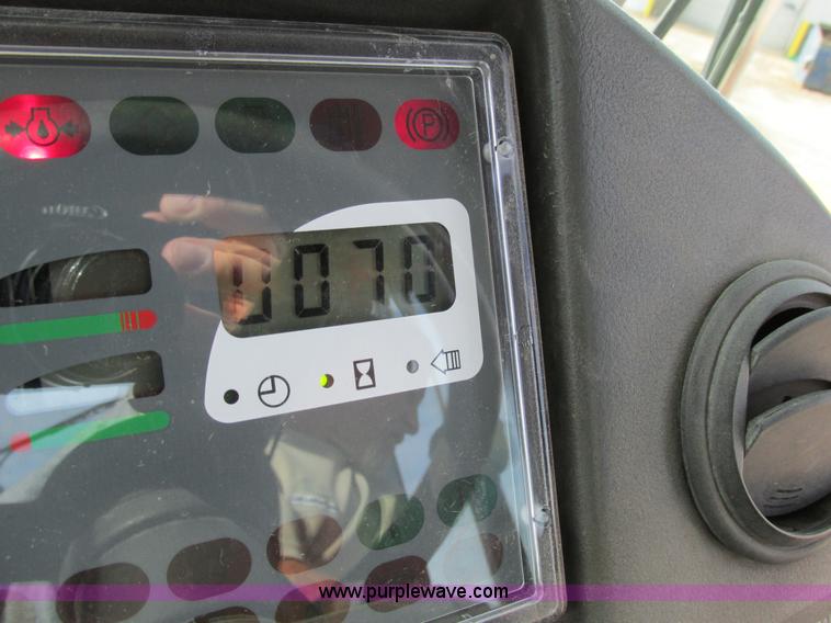 image for item K5211 2004 John Deere 304H wheel loader