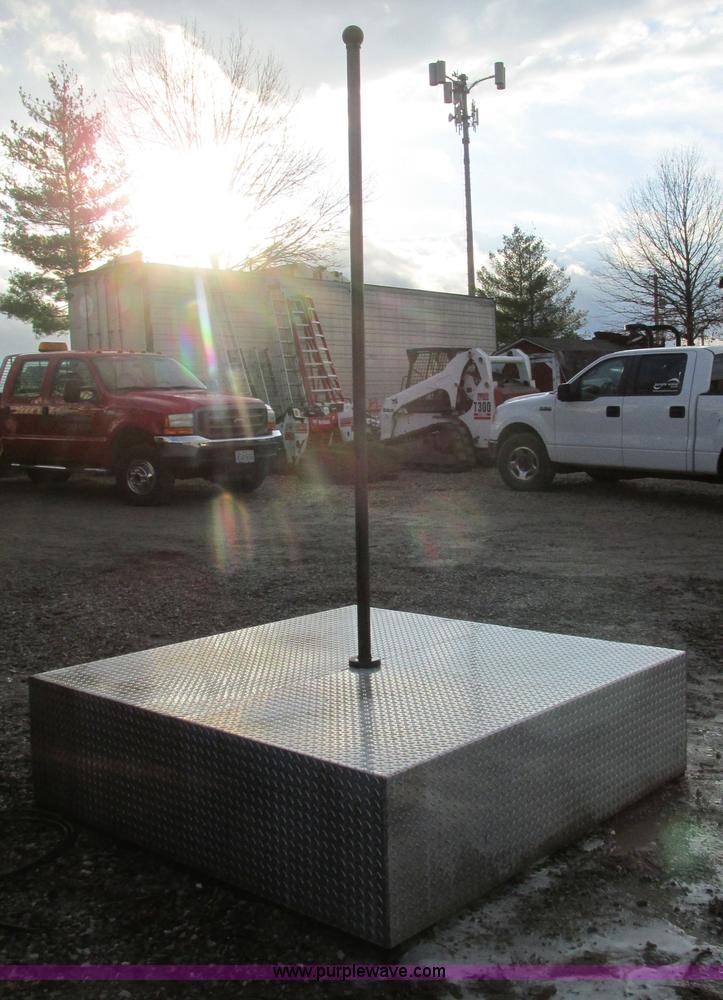 image for item K5245 Skid steer platform and flag pole display