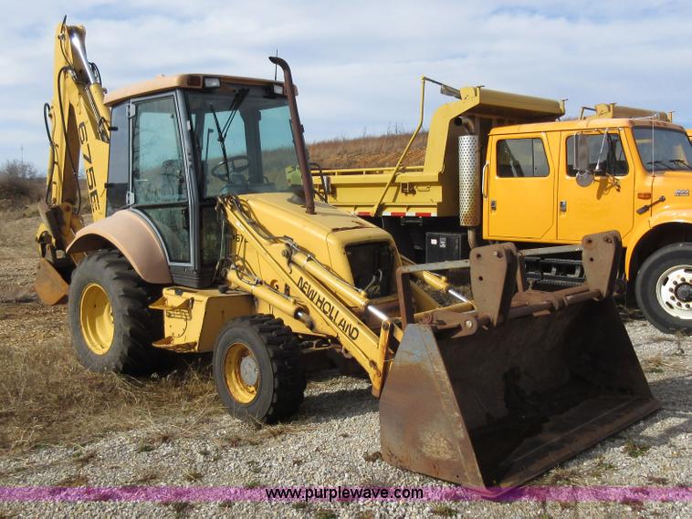 image for item K5253 1999 New Holland 675E backhoe