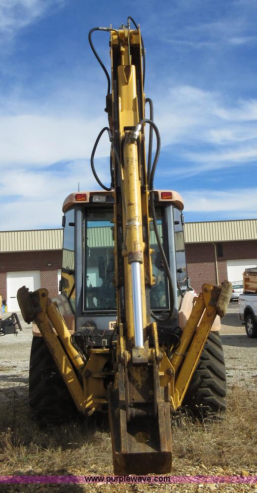 image for item K5253 1999 New Holland 675E backhoe