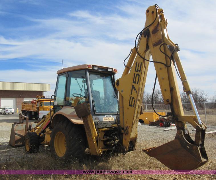 image for item K5253 1999 New Holland 675E backhoe