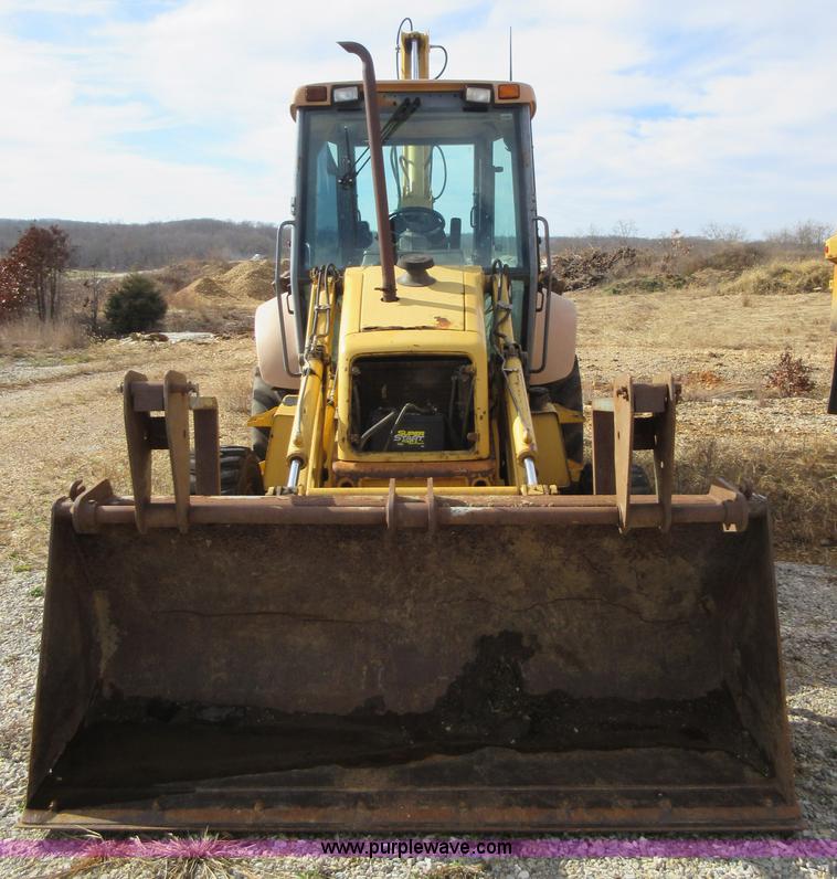 image for item K5253 1999 New Holland 675E backhoe