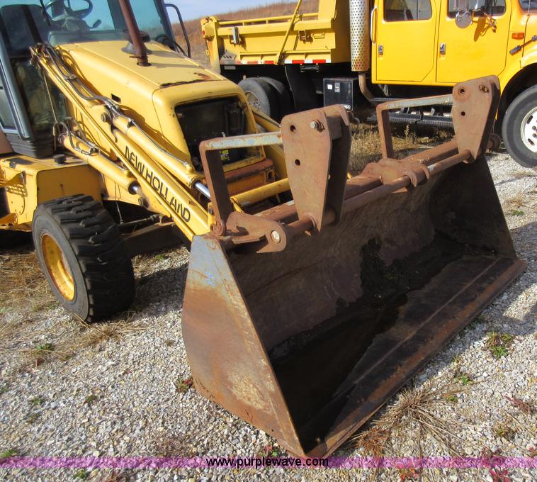 image for item K5253 1999 New Holland 675E backhoe