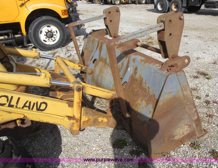 image for item K5253 1999 New Holland 675E backhoe