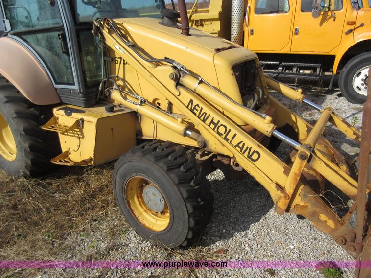 image for item K5253 1999 New Holland 675E backhoe