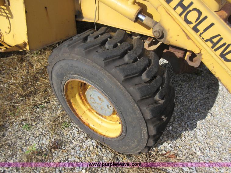 image for item K5253 1999 New Holland 675E backhoe