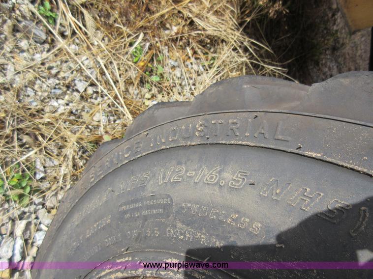 image for item K5253 1999 New Holland 675E backhoe