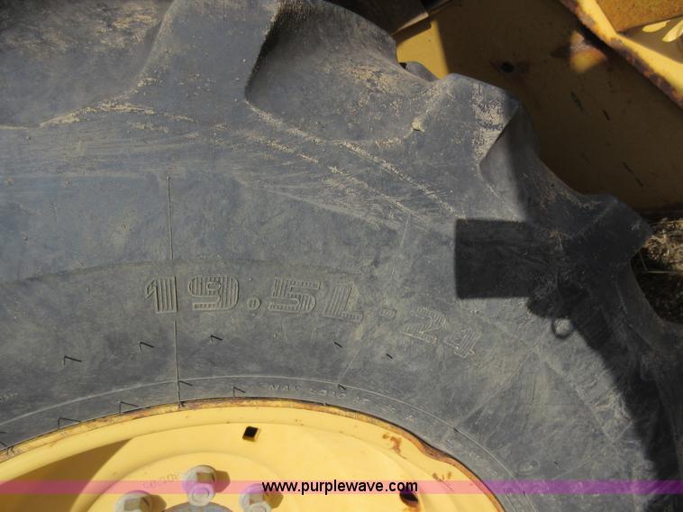 image for item K5253 1999 New Holland 675E backhoe