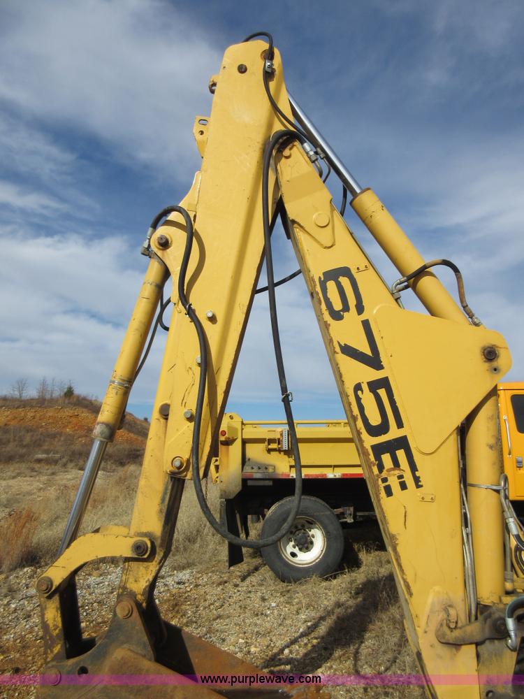 image for item K5253 1999 New Holland 675E backhoe