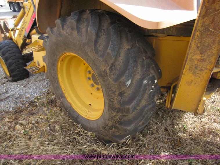 image for item K5253 1999 New Holland 675E backhoe