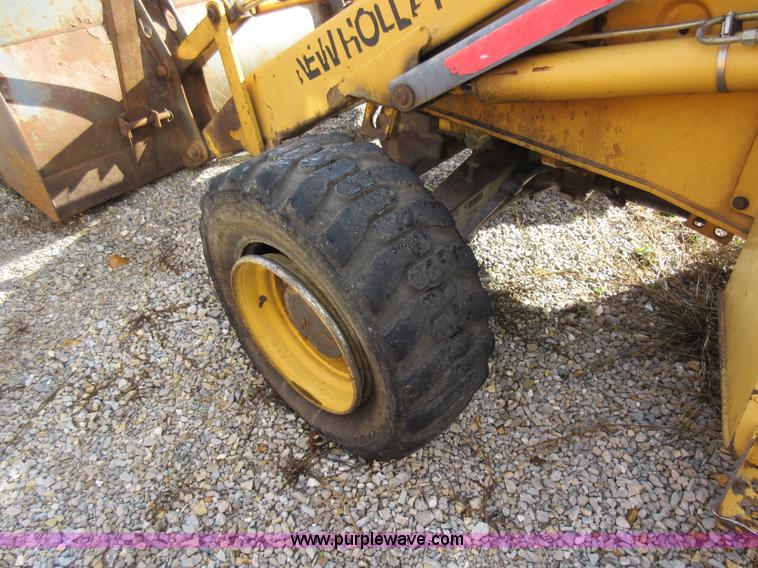 image for item K5253 1999 New Holland 675E backhoe