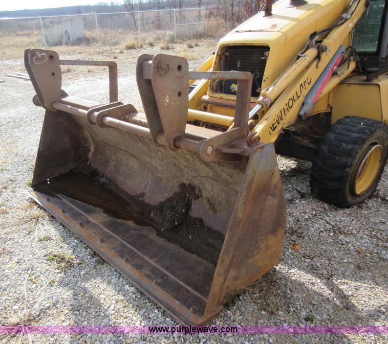 image for item K5253 1999 New Holland 675E backhoe