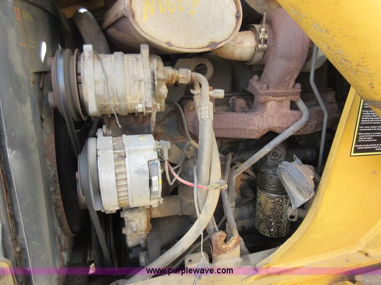 image for item K5253 1999 New Holland 675E backhoe