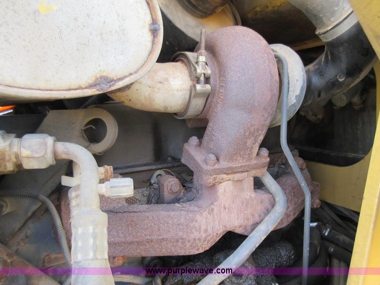 image for item K5253 1999 New Holland 675E backhoe