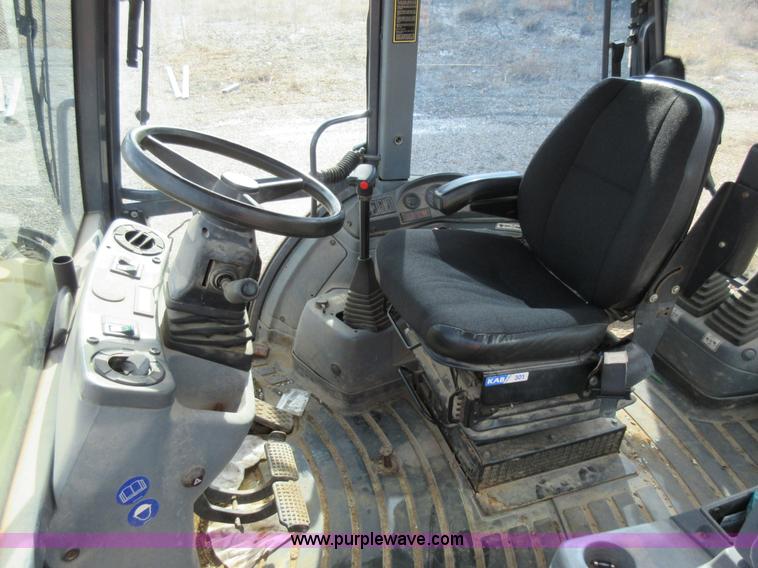 image for item K5253 1999 New Holland 675E backhoe