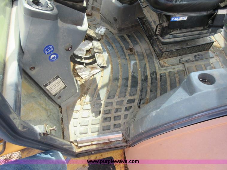 image for item K5253 1999 New Holland 675E backhoe