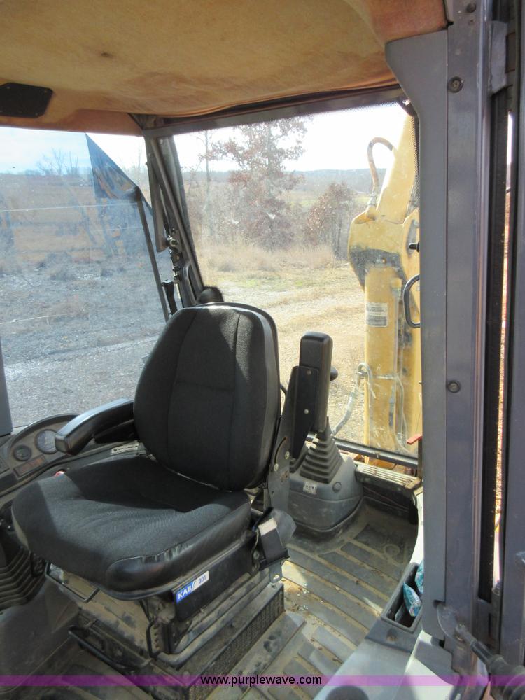 image for item K5253 1999 New Holland 675E backhoe