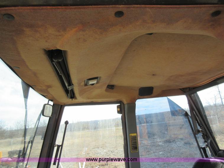 image for item K5253 1999 New Holland 675E backhoe