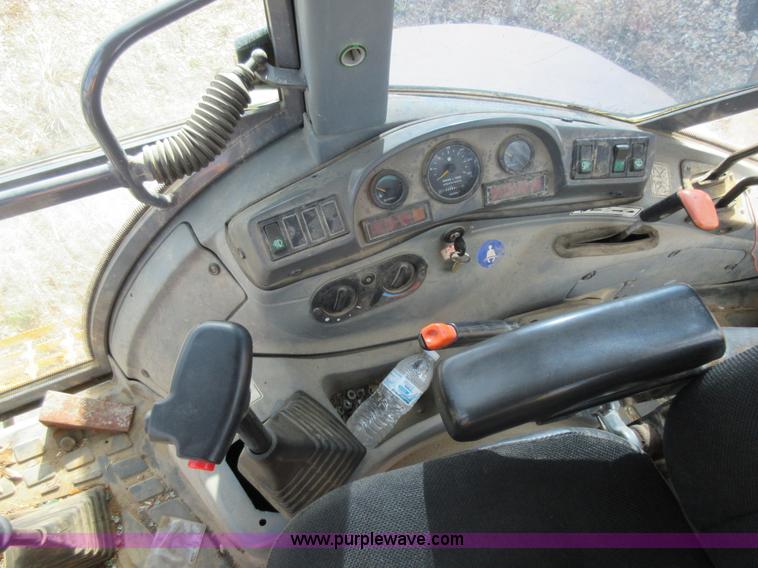 image for item K5253 1999 New Holland 675E backhoe