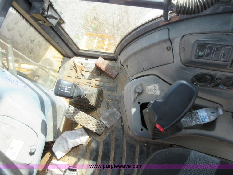 image for item K5253 1999 New Holland 675E backhoe