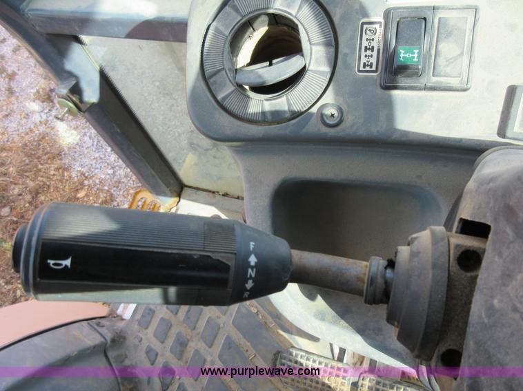 image for item K5253 1999 New Holland 675E backhoe