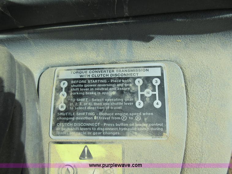 image for item K5253 1999 New Holland 675E backhoe