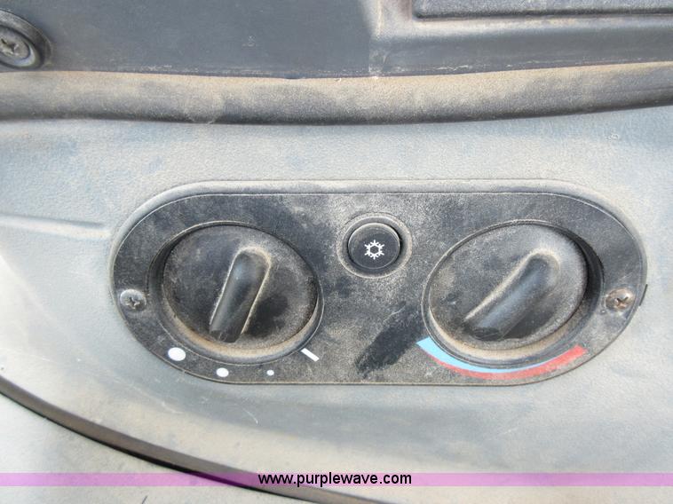 image for item K5253 1999 New Holland 675E backhoe