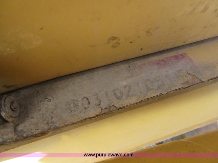 image for item K5253 1999 New Holland 675E backhoe