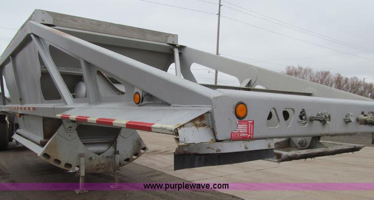 image for item L1849 1999 Trail King bottom dump trailer